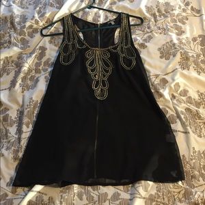 Black and gold tunic